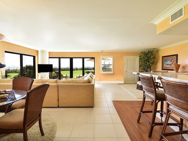 tiled living room with crown molding