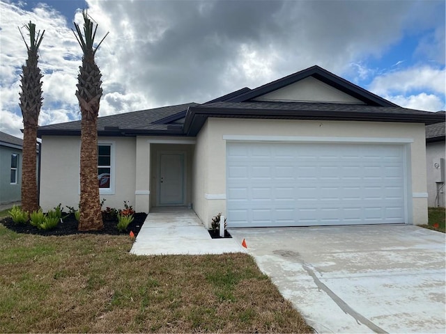 single story home featuring a front yard and a garage