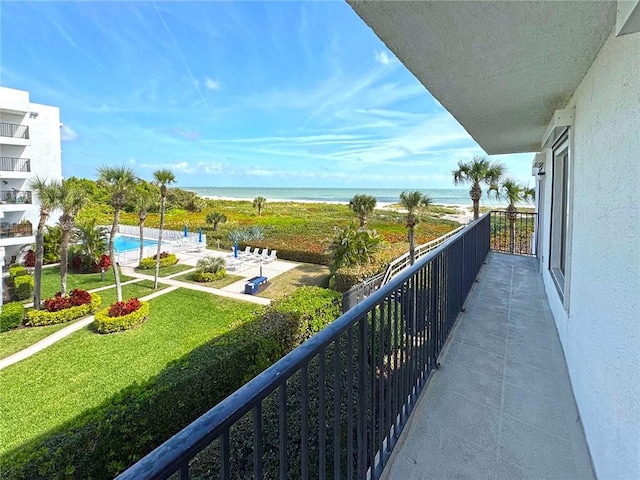 balcony featuring a water view