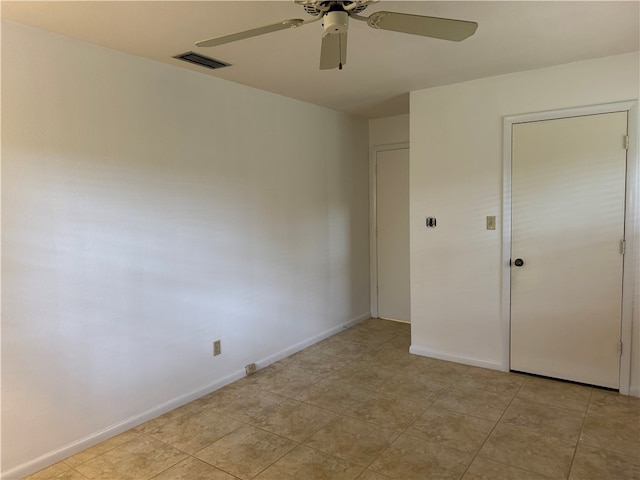 empty room featuring ceiling fan