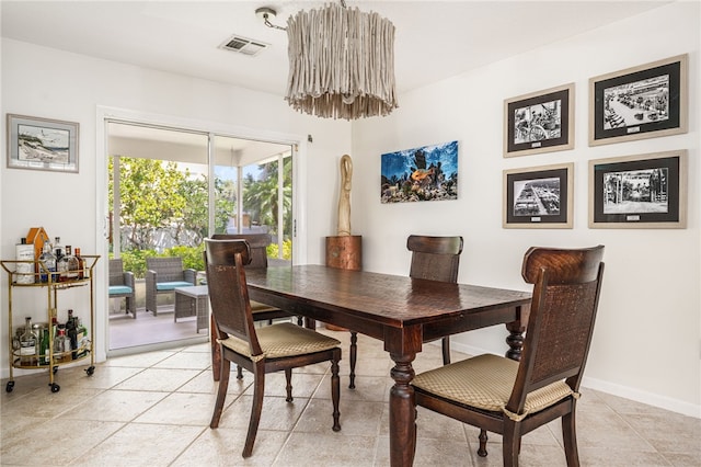 616 Broadway St, Vero Beach, FL 32960 - dining space featuring light tile patterned floors and baseboards