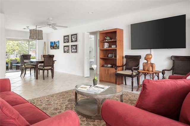 616 Broadway St, Vero Beach, FL 32960 - living room featuring ceiling fan, baseboards, and tile patterned floors