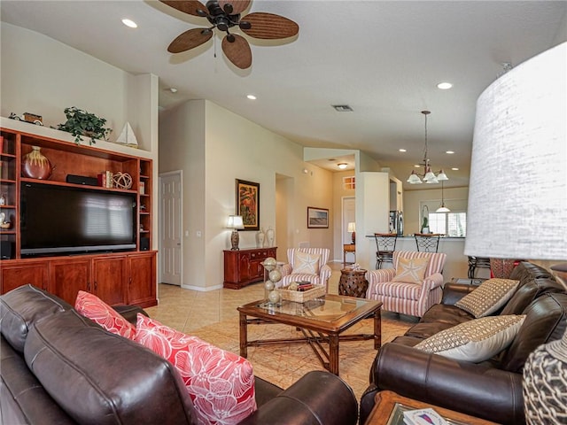 6243 Thames Pl, Vero Beach, FL 32966 - living room featuring a ceiling fan, recessed lighting, a chandelier, light tile patterned floors, and vaulted ceiling