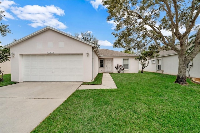 ranch-style house with a garage and a front lawn