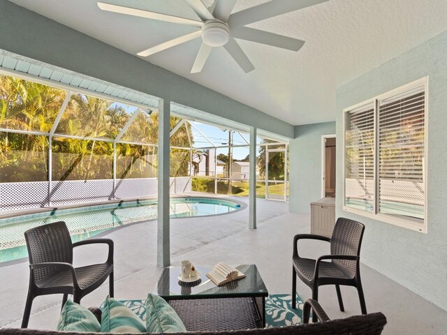 interior space featuring ceiling fan and a lanai