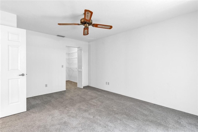 737 Timber Ridge Trl SW Unit B, Vero Beach, FL 32962 - unfurnished bedroom featuring carpet flooring, a closet, and ceiling fan