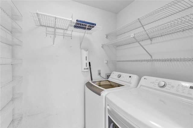 737 Timber Ridge Trl SW Unit B, Vero Beach, FL 32962 - washroom featuring independent washer and dryer