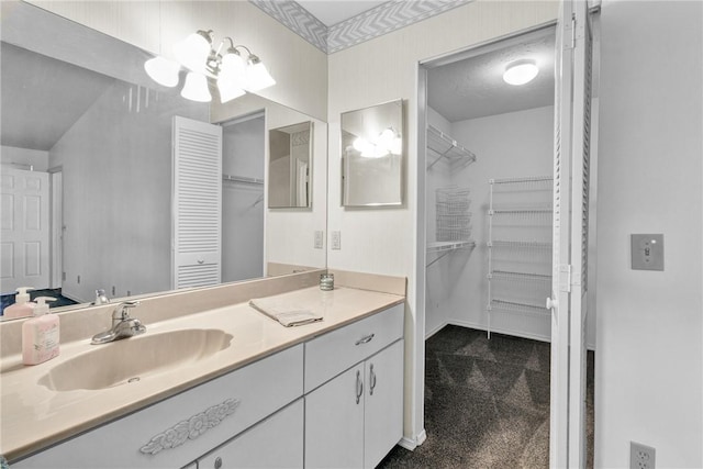 737 Timber Ridge Trl SW Unit B, Vero Beach, FL 32962 - full bath featuring vanity and a walk in closet