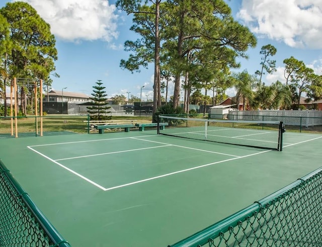 737 Timber Ridge Trl SW Unit B, Vero Beach, FL 32962 - view of tennis court featuring community basketball court