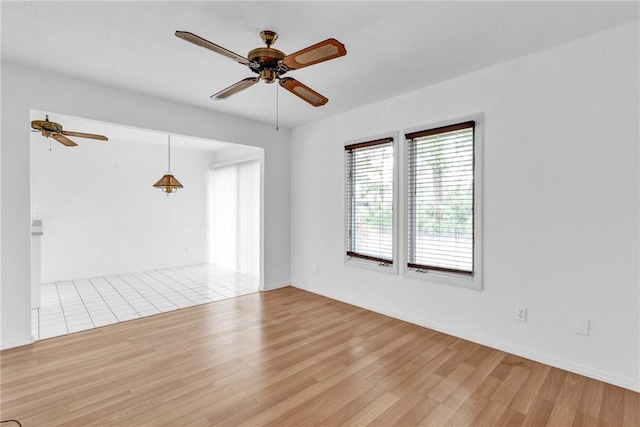 737 Timber Ridge Trl SW Unit B, Vero Beach, FL 32962 - spare room featuring ceiling fan and wood finished floors