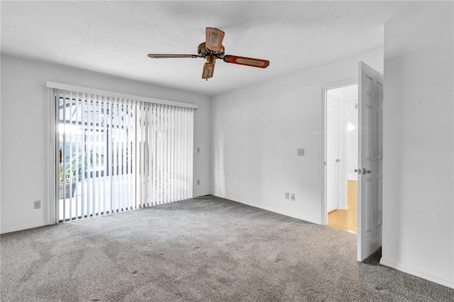 737 Timber Ridge Trl SW Unit B, Vero Beach, FL 32962 - carpeted empty room featuring ceiling fan and baseboards