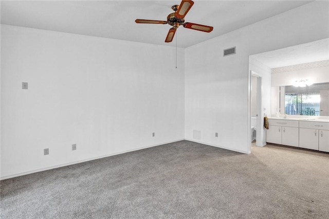 737 Timber Ridge Trl SW Unit B, Vero Beach, FL 32962 - unfurnished room featuring light colored carpet and ceiling fan