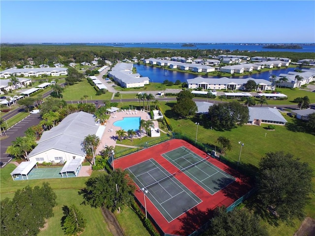 aerial view with a residential view and a water view