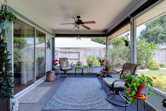 sunroom with plenty of natural light and ceiling fan