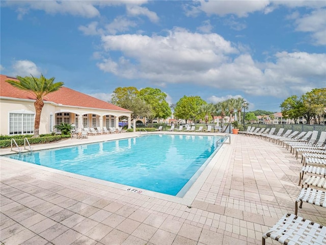 view of pool featuring a patio area