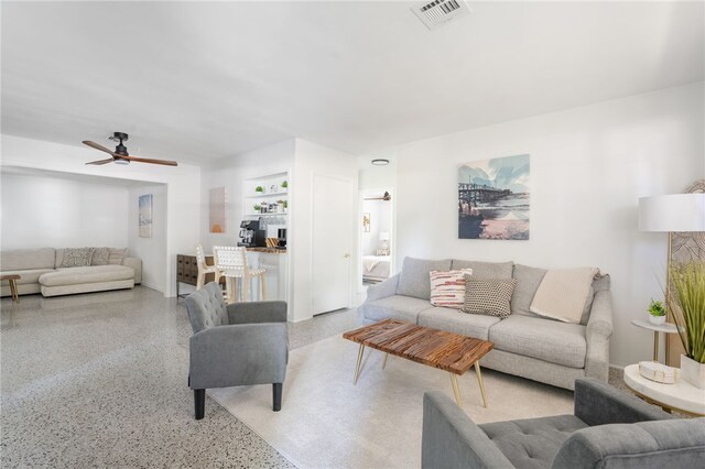 living room featuring ceiling fan