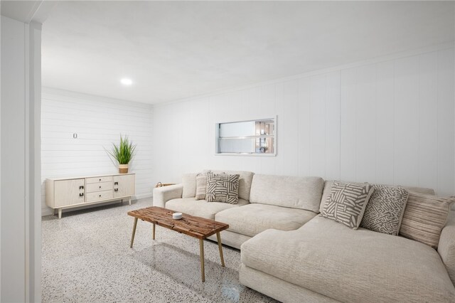 living room featuring wooden walls