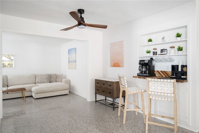 living room with ceiling fan