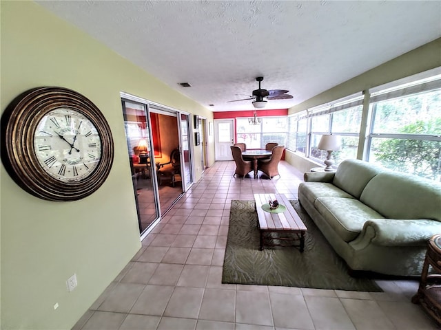 sunroom / solarium with ceiling fan