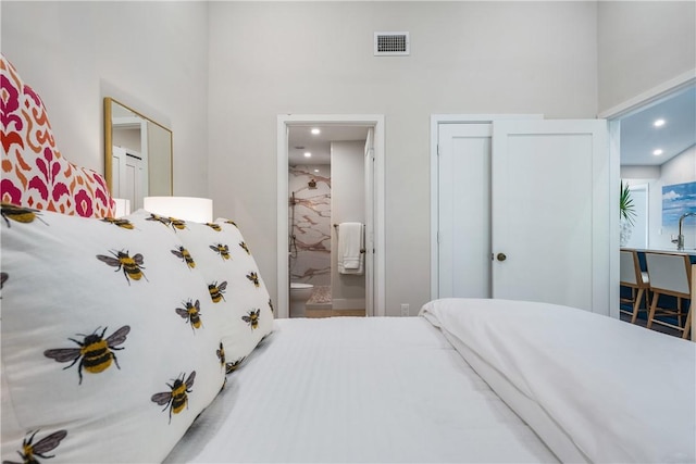 bedroom with ensuite bath