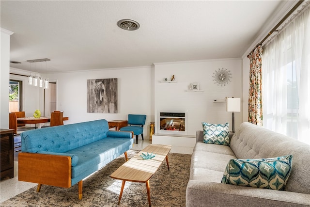 living room with ornamental molding