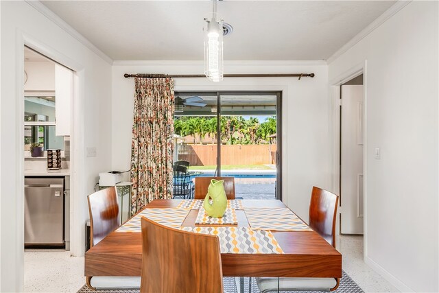 dining space featuring ornamental molding