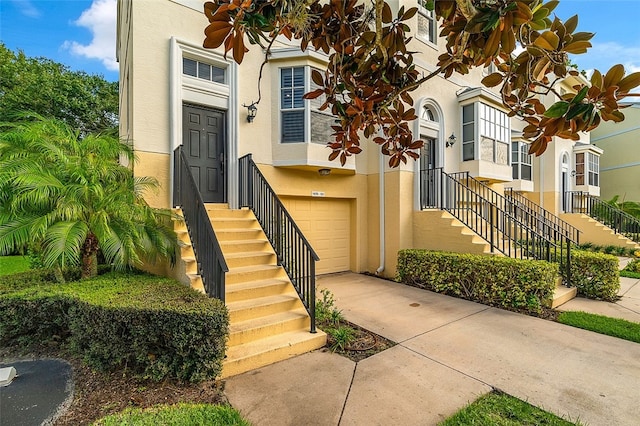 doorway to property featuring a garage