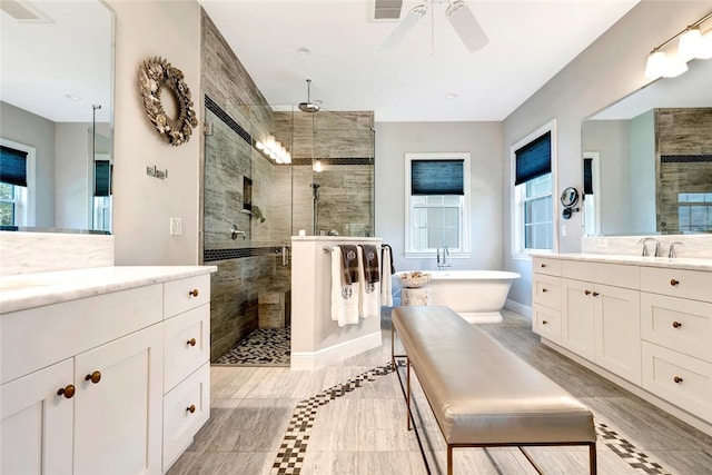 bathroom with shower with separate bathtub, vanity, and ceiling fan