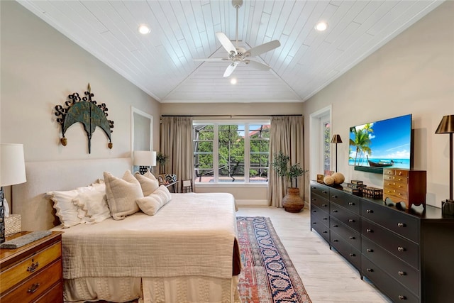 bedroom with ceiling fan, light hardwood / wood-style floors, vaulted ceiling, and wooden ceiling