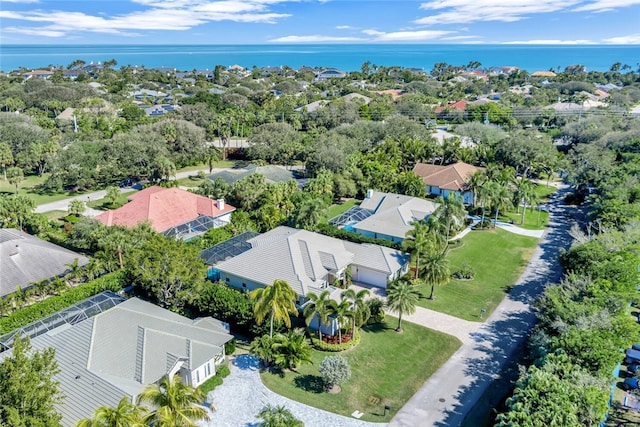 birds eye view of property featuring a water view