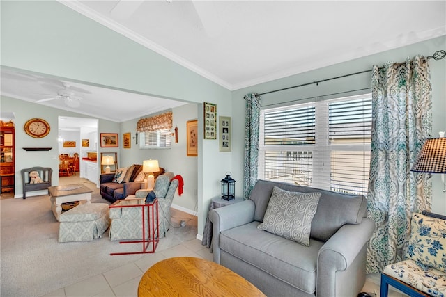 tiled living area featuring baseboards, a ceiling fan, crown molding, and lofted ceiling