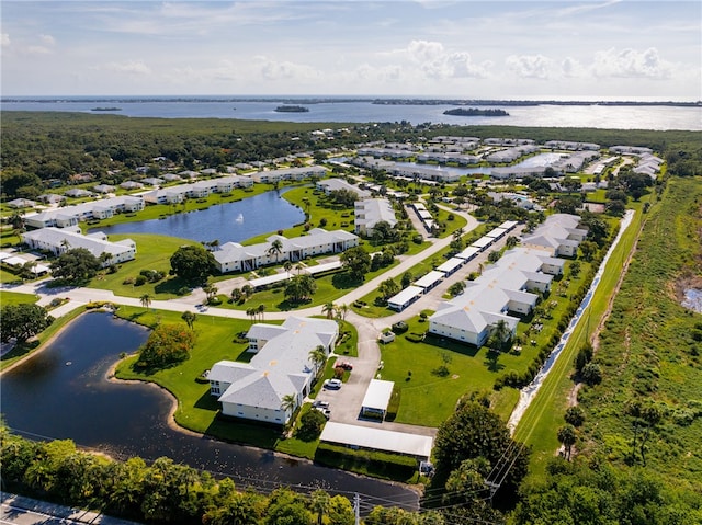 bird's eye view with a water view