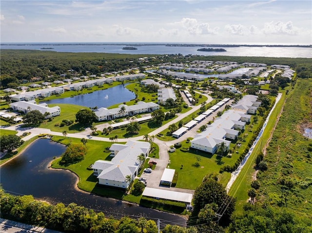 740 Lake Orchid Cir Unit 205, Vero Beach, FL 32962 - aerial view of property and surrounding area featuring a nearby body of water and nearby suburban area