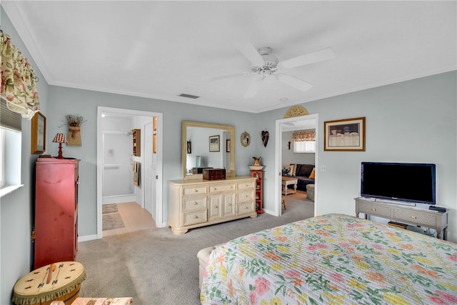 bedroom featuring visible vents, baseboards, carpet floors, multiple windows, and a ceiling fan