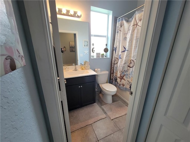 1808 Berkshire Cir SW, Vero Beach, FL 32968 - bathroom with tile patterned flooring, vanity, and shower / tub combo with curtain