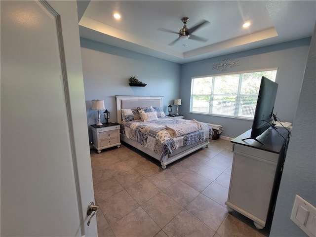 1808 Berkshire Cir SW, Vero Beach, FL 32968 - bedroom with a tray ceiling, recessed lighting, a ceiling fan, and light tile patterned floors