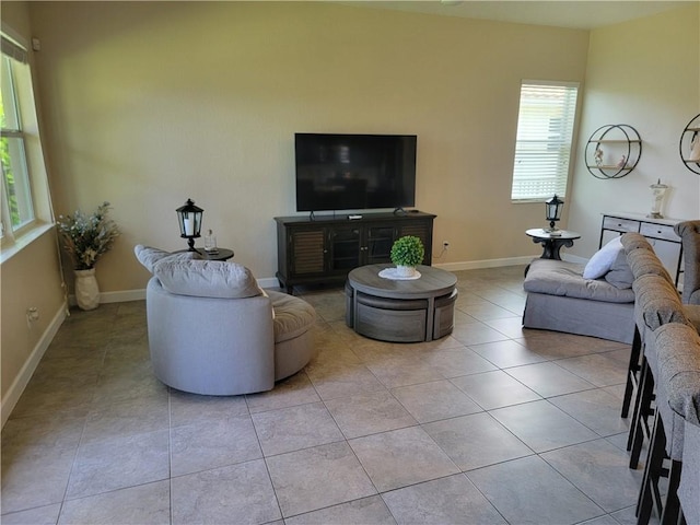 1808 Berkshire Cir SW, Vero Beach, FL 32968 - living room with tile patterned floors and baseboards