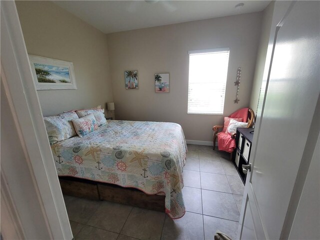 1808 Berkshire Cir SW, Vero Beach, FL 32968 - bedroom featuring light tile patterned flooring and baseboards