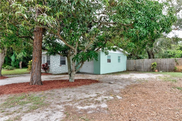 view of yard with a garage