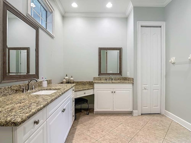 7330 36th Ct, Vero Beach, FL 32967 - full bath featuring ornamental molding, a sink, two vanities, and tile patterned floors