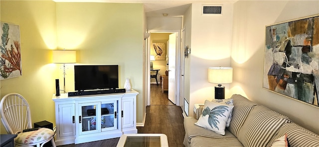 living room with dark hardwood / wood-style floors