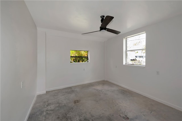 empty room featuring ceiling fan