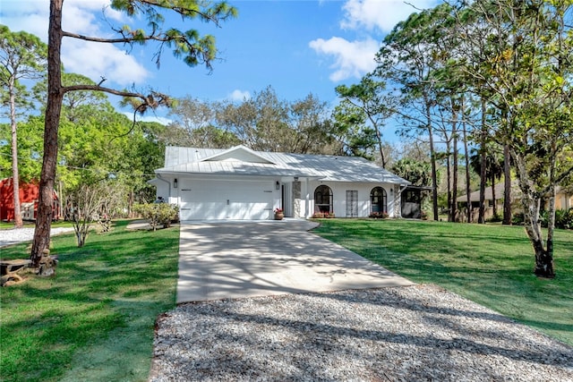 ranch-style house featuring a garage and a front yard