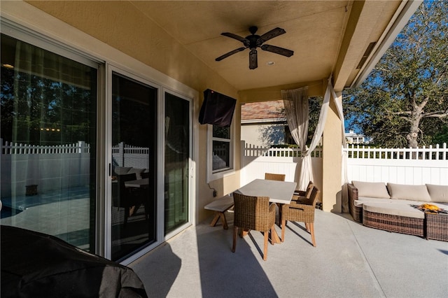 view of patio with ceiling fan