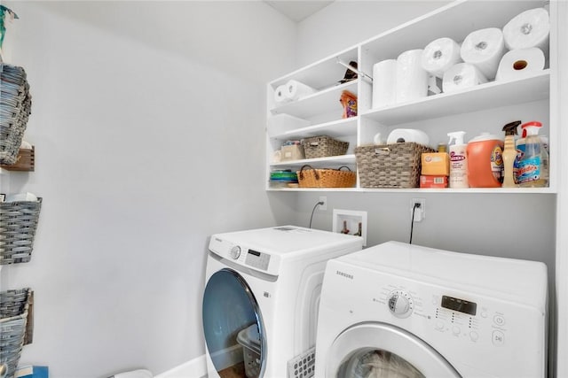 laundry room with washer and dryer