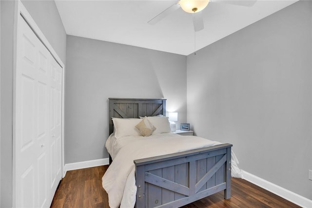 bedroom featuring a closet, dark wood-type flooring, and ceiling fan