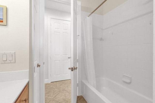 bathroom featuring shower / tub combo, vanity, and tile patterned floors