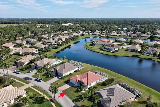 bird's eye view with a water view