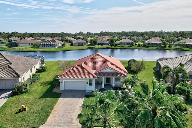 birds eye view of property featuring a water view