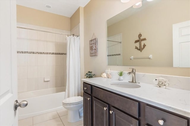 full bathroom with tile patterned flooring, vanity, shower / bath combo, and toilet